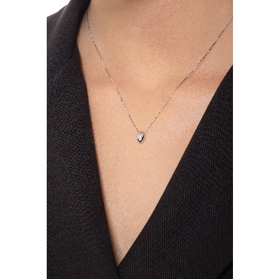 Collar de oro blanco 18k y diamante 0.06 quilates en forma de grano de arroz