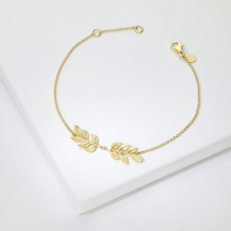 Pulsera de oro amarillo 18k con dos hojas Pulsera de oro amarillo 18k con dos hojas