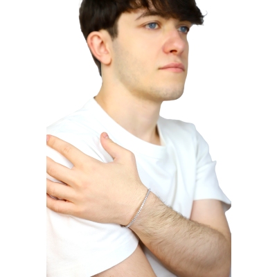 Pulsera tennis elastica en oro blanco 18k con diamantes