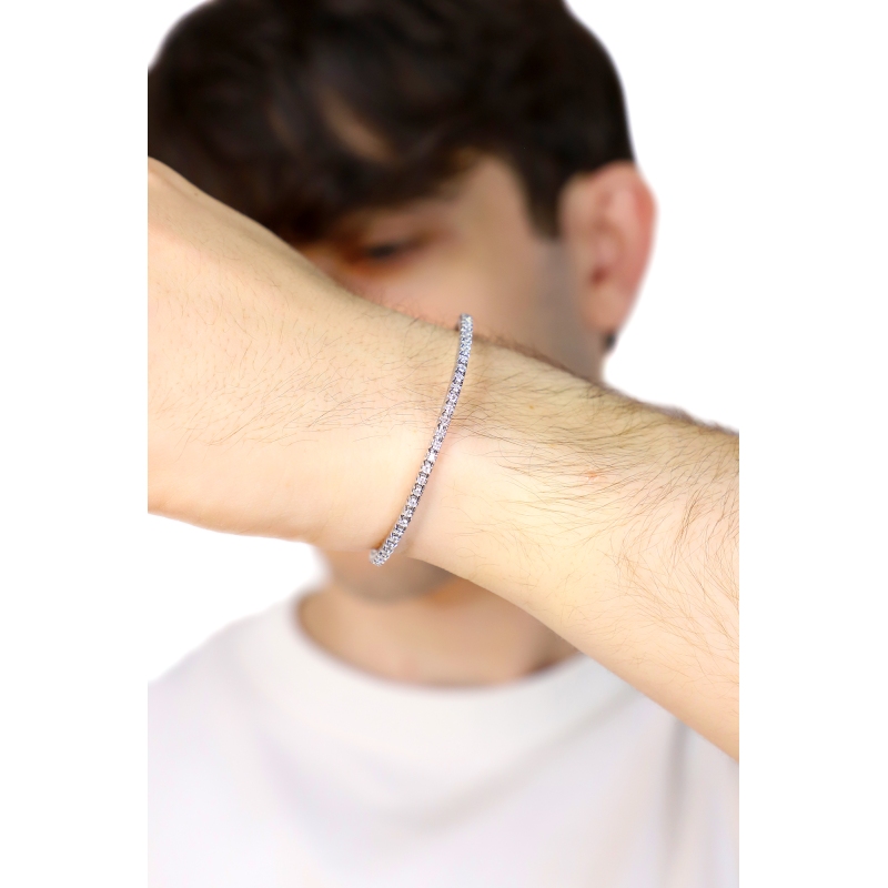 Pulsera tennis elastica en oro blanco 18k con diamantes