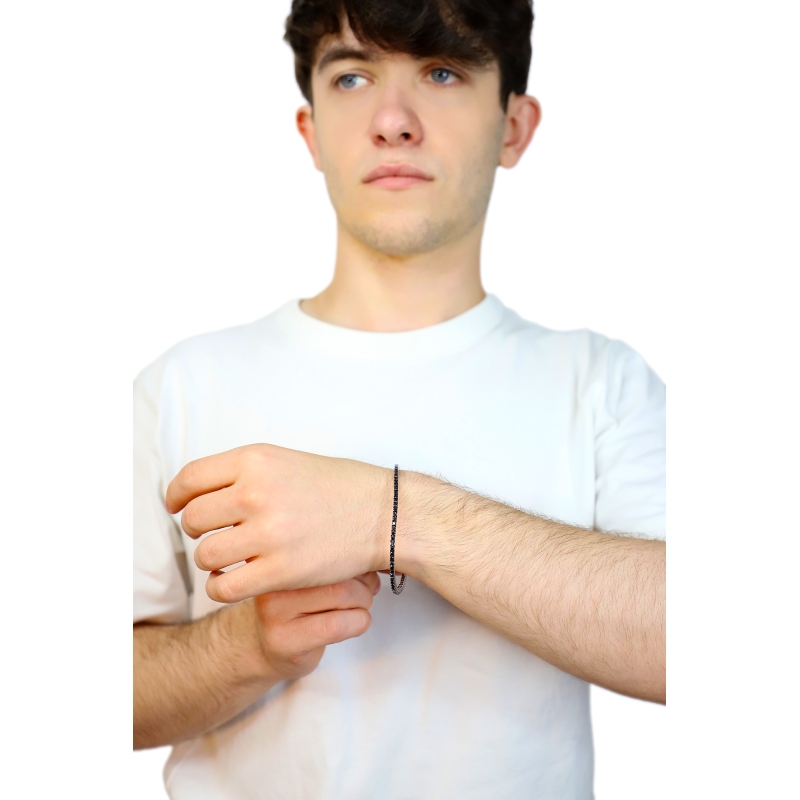 Pulsera tennis elastica en oro blanco de 18k con diamantes negros