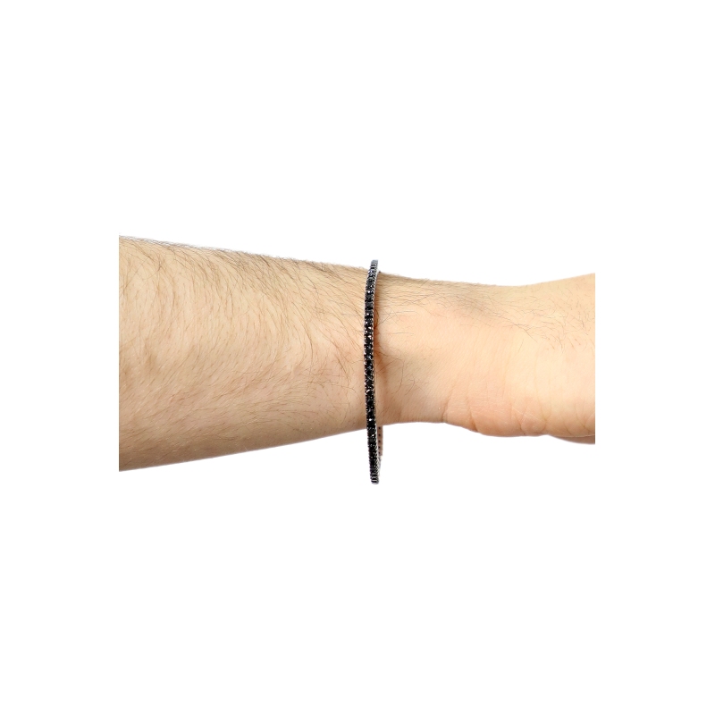 Pulsera tennis elastica con diamantes negros en oro blanco 750