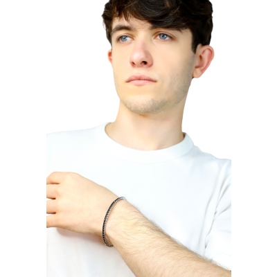 Pulsera riviera elastica en oro blanco 18k con diamantes negros