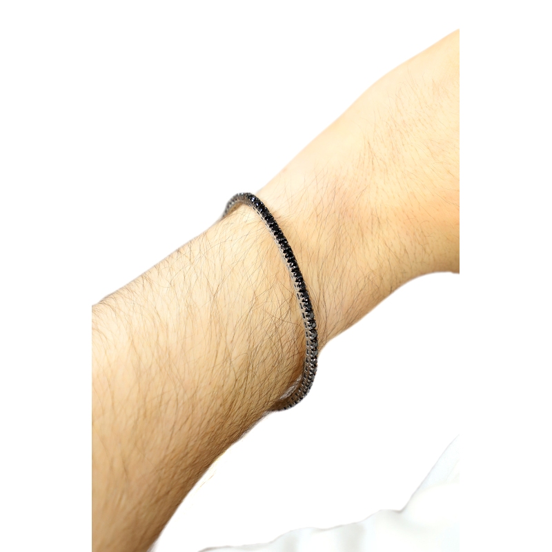 Pulsera riviera elastica en oro blanco 18k con diamantes negros