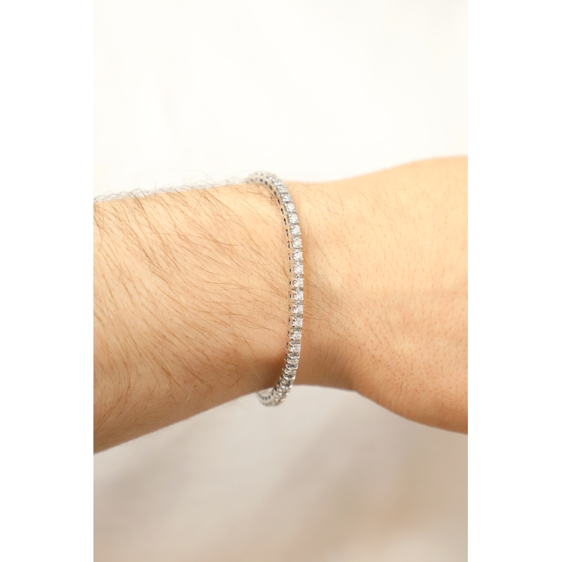 Pulsera en oro blanco 18k con diamantes tennis elástica