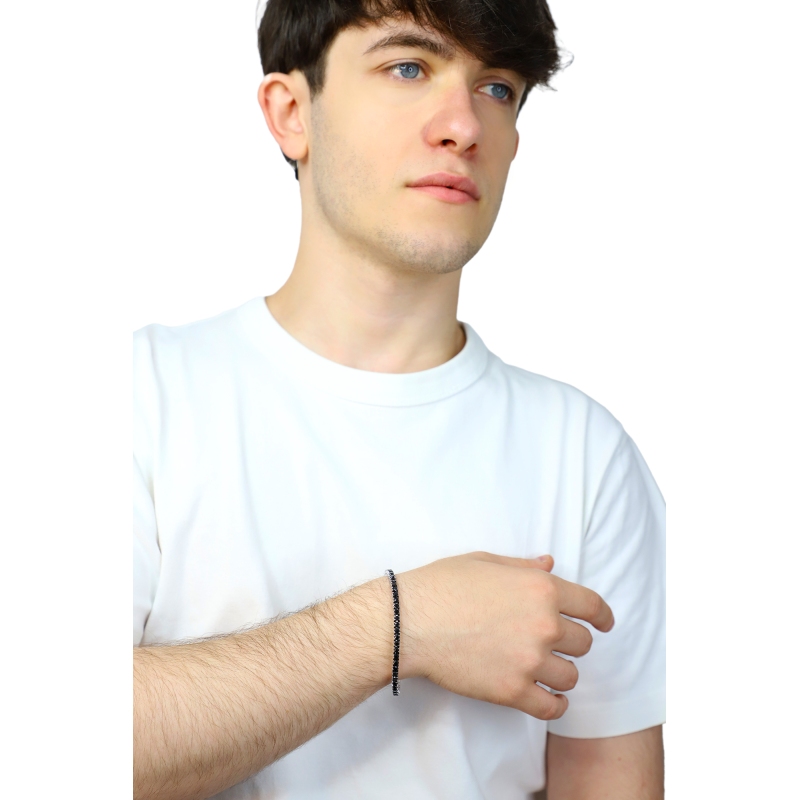 Pulsera tennis elástica con diamantes negros en oro blanco 750