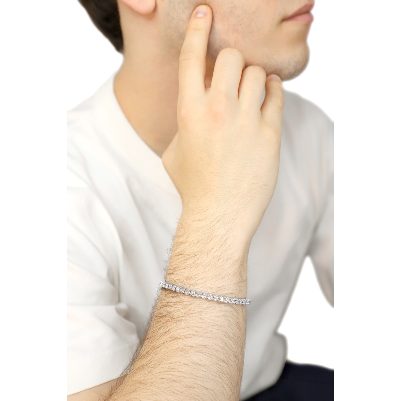 Pulsera tennis elástica en oro blanco 18k con diamantes talla brillante
