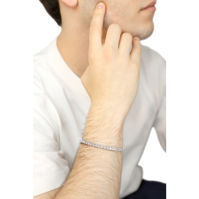 Pulsera tennis elástica en oro blanco 18k con diamantes talla brillante