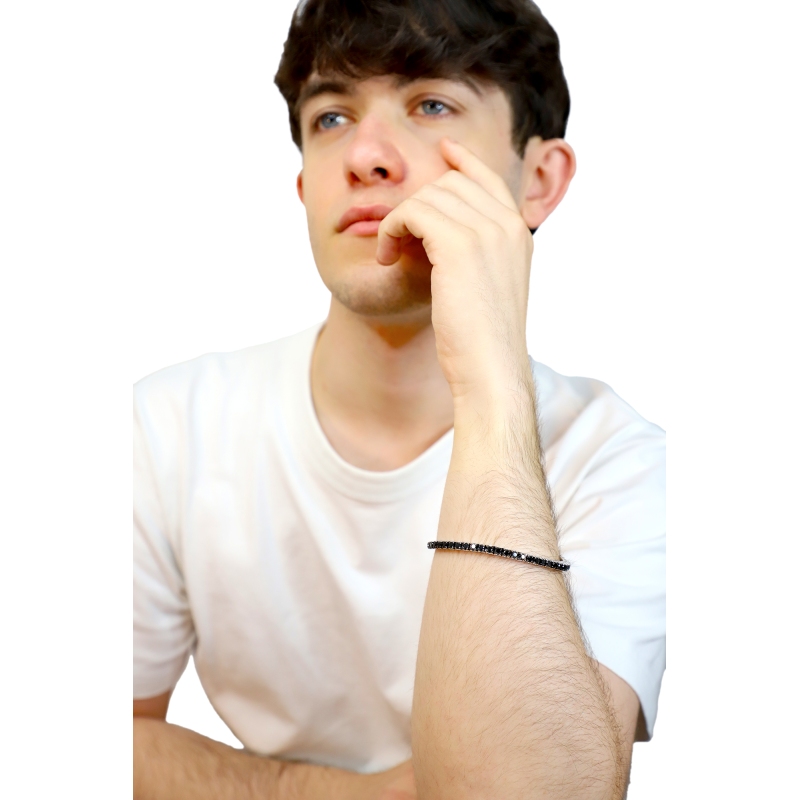 Pulsera tennis elástica en oro blanco 18k con diamantes negros