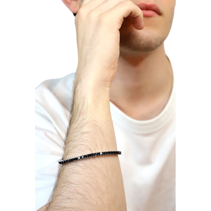 Pulsera tennis elástica en oro blanco 18k con diamantes negros
