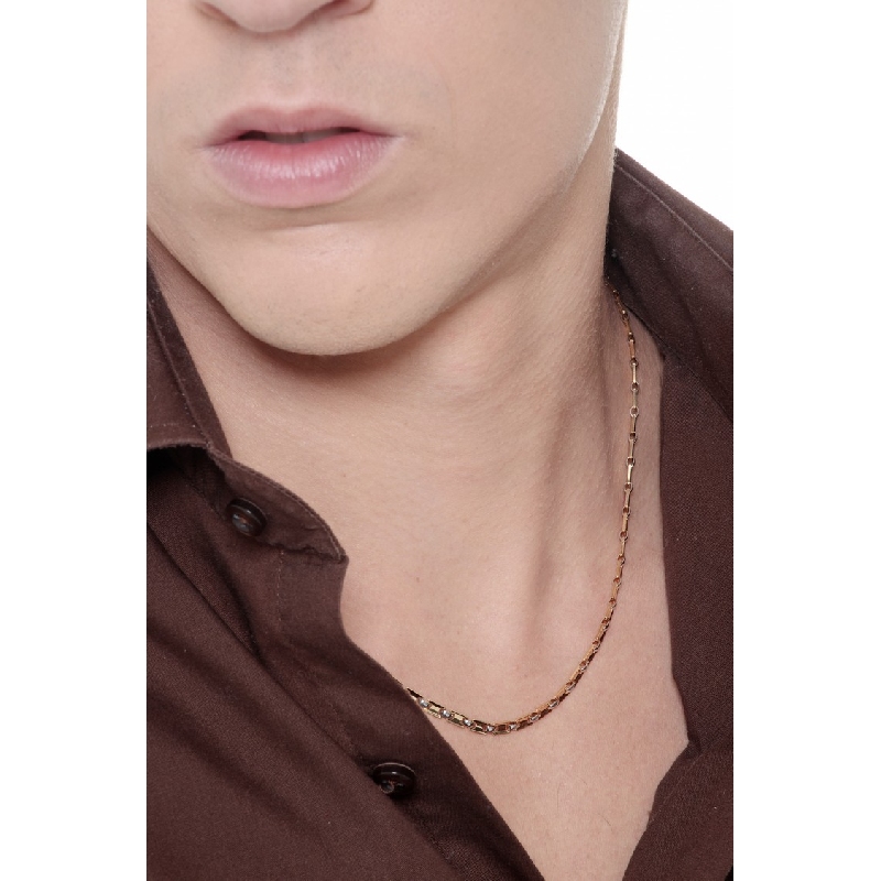 Cadena para hombre en oro blanco y amarillo de 18 kilates Cadena para hombre en oro blanco y amarillo de 18 kilates