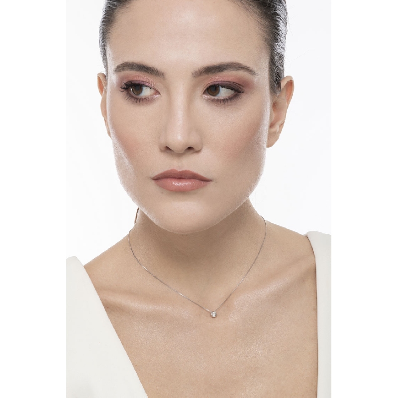 Colgante diamante solitario a bisel 0,05 quilates oro blanco 18 kilates