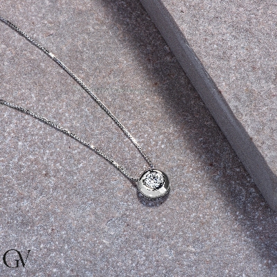 Colgante solitario 0.10 quilates diamante y oro blanco 18 kilates