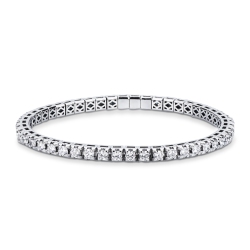 Pulsera tennis elástica en oro blanco 18k con diamantes talla brillante