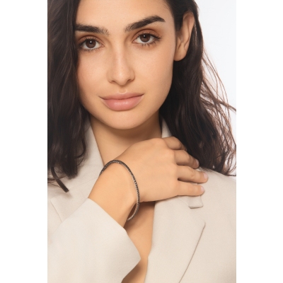 Pulsera tennis elastica en oro blanco de 18k con diamantes negros