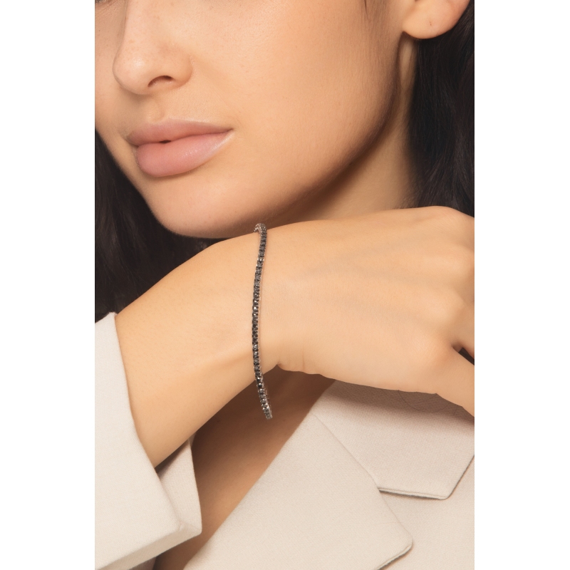 Pulsera tennis elastica en oro blanco de 18k con diamantes negros