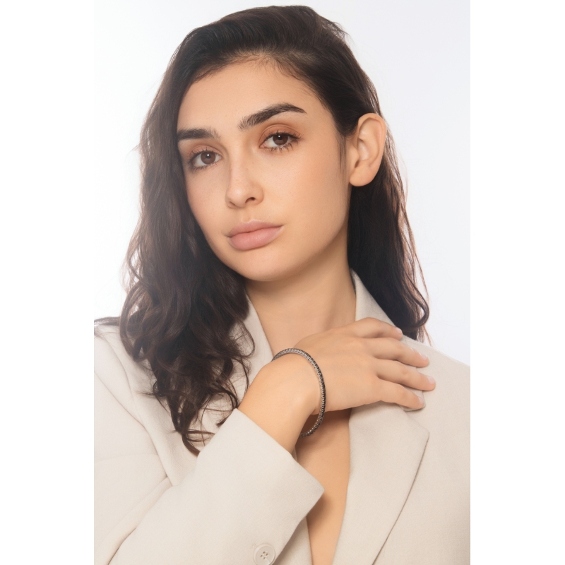 Pulsera riviera elastica en oro blanco 18k con diamantes negros