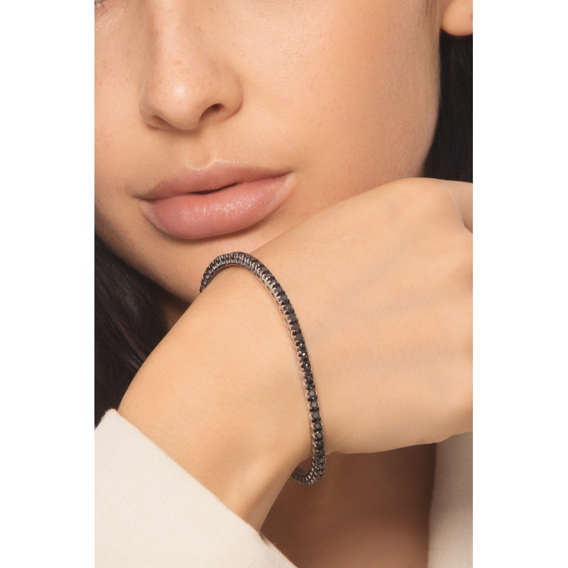 Pulsera riviera elastica en oro blanco 18k con diamantes negros