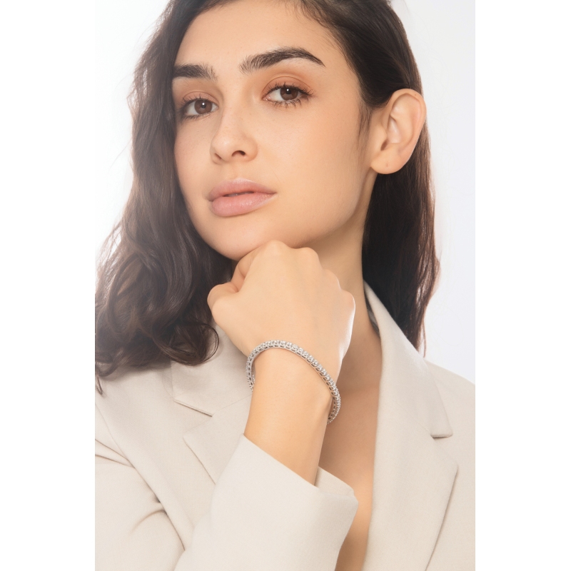 Pulsera tennis elástica en oro blanco 18k con diamantes talla brillante