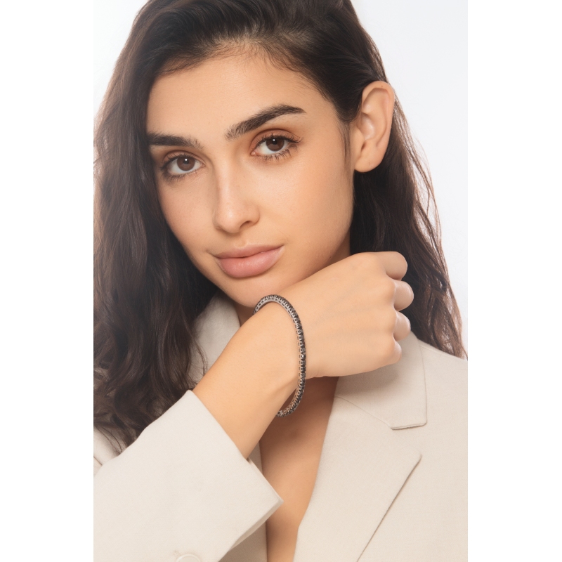 Pulsera tennis elástica en oro blanco 18k con diamantes negros