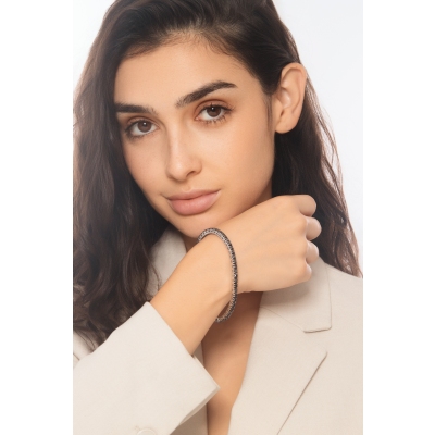 Pulsera tennis elástica en oro blanco 18k con diamantes negros