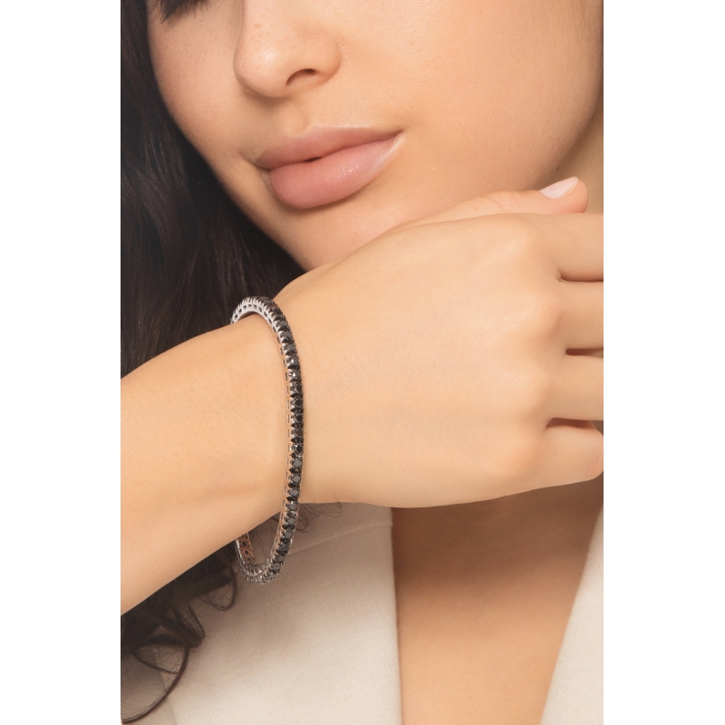 Pulsera tennis elástica en oro blanco 18k con diamantes negros