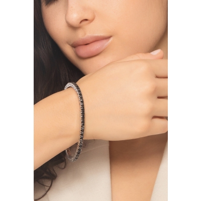 Pulsera tennis elástica en oro blanco 18k con diamantes negros