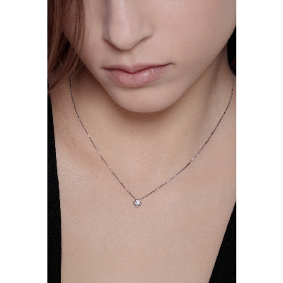 Cadena con diamante solitario de 0.20 quilates en oro blanco 