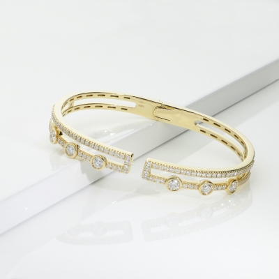 Pulsera semirrígida en oro amarillo 18k con diamantes