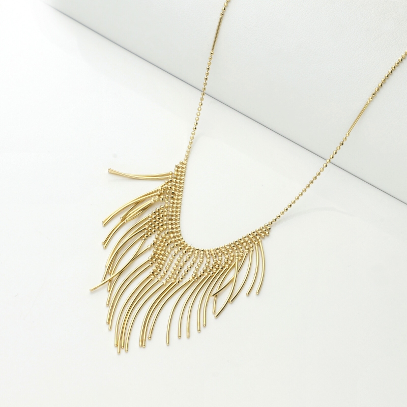 Collar en oro amarillo 18k con bolitas godronadas y barras lisas Collar en oro amarillo 18k con bolitas godronadas y barras lisas