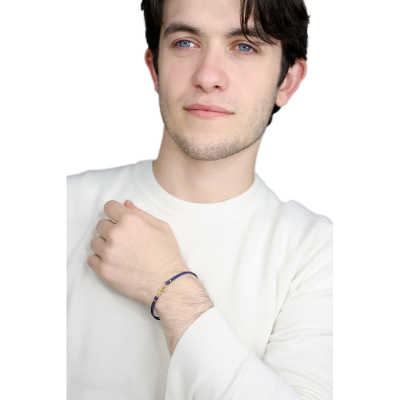 Pulsera de tela azul con nudo central en oro amarillo 18k Pulsera de tela azul con nudo central en oro amarillo 18k