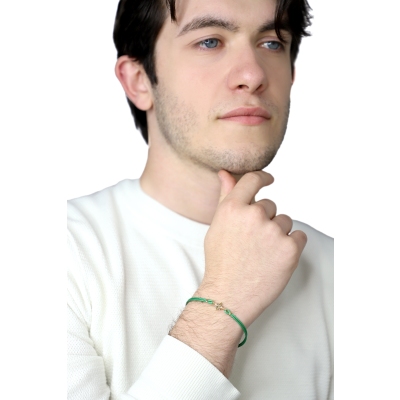 Pulsera tela verde y estrella en oro amarillo y blanco 18k