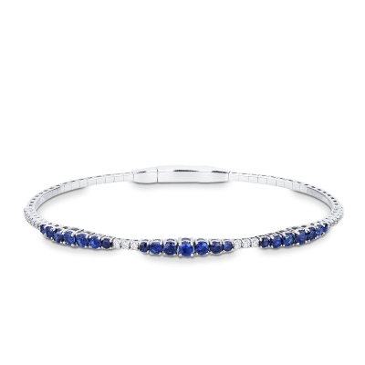 Pulsera rígida en oro blanco de 18k con zafiros azules y diamantes