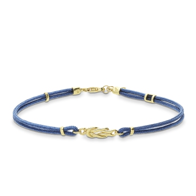 Pulsera de tela azul con nudo central en oro amarillo 18k