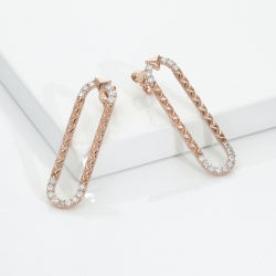Pendientes en oro rosa 18K con detalles de diamantes