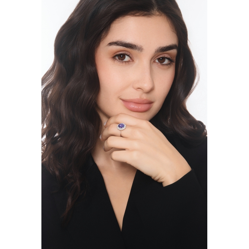 Anillo halo en oro blanco 18k con tanzanita y diamantes