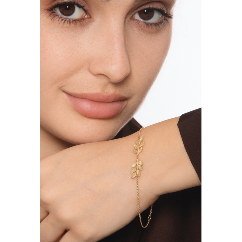Pulsera de oro amarillo 18k con dos hojas