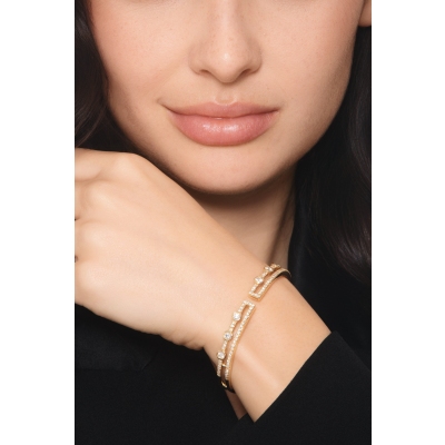 Pulsera semirrígida en oro amarillo 18k con diamantes