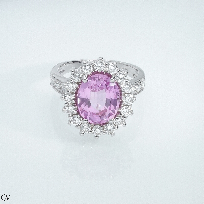 Anillo halo en oro blanco 18k con zafiro rosa y diamantes 