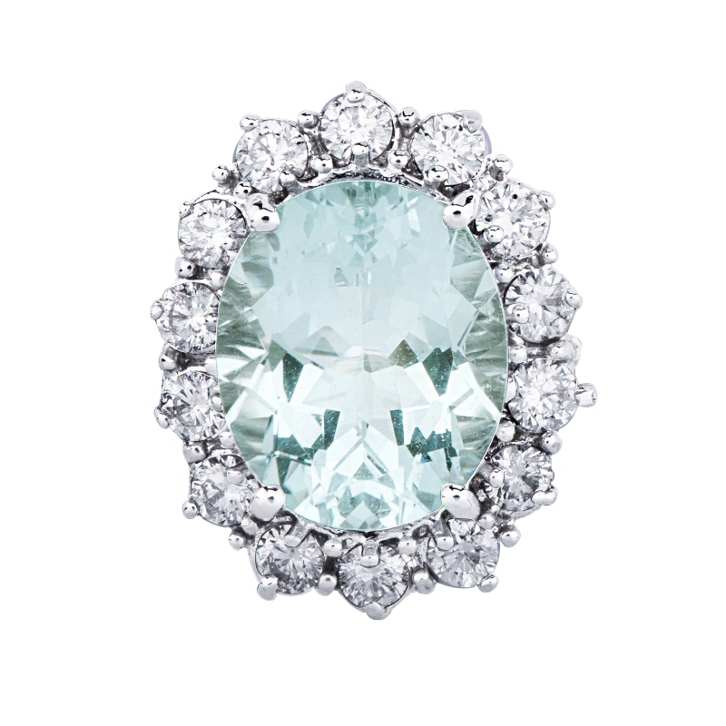 Anillo contorno oro 18k con aguamarina oval y 14 diamantes