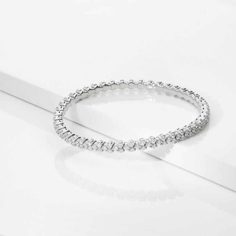 Pulsera elástica de diseño en oro blanco 18k con diamantes