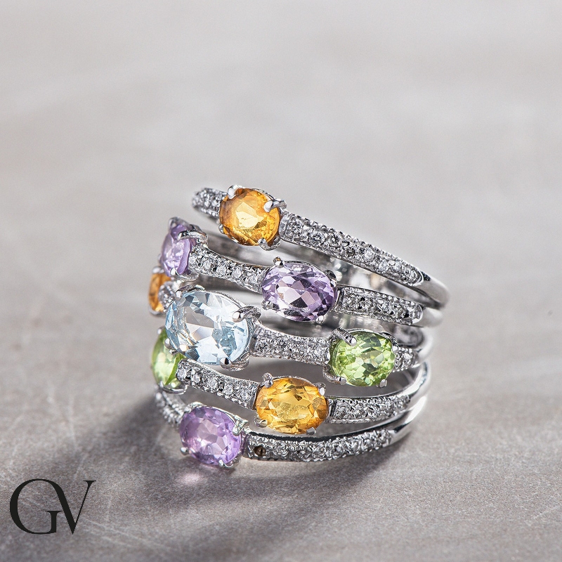 Anillo de banda en oro blanco 18k con peridoto, citrino, amatista, aguamarina y diamantes
