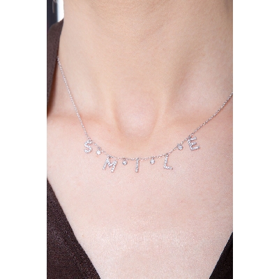 Collar letras SMILE oro blanco y diamantes