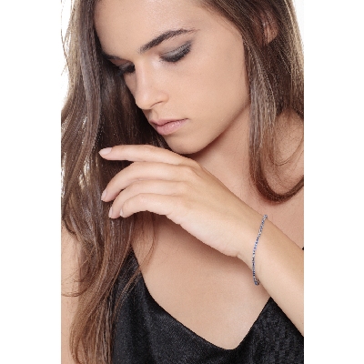 Pulsera Tennis en oro blanco de 18k con zafiros azules y diamantes