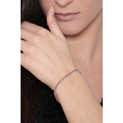 Pulsera Tennis fina en oro blanco de 18k con rubíes