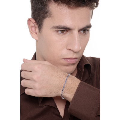 Pulsera Tennis en oro blanco de 18k con diamantes y zafiros azules