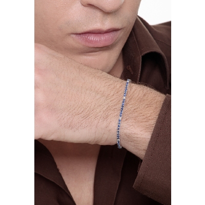 Pulsera Tennis en oro blanco de 18k con diamantes y zafiros azules