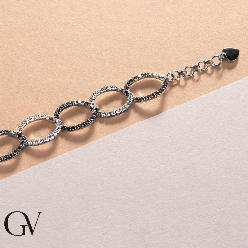 Pulsera en oro blanco 18K con diamantes negros y blancos Pulsera en oro blanco 18K con diamantes negros y blancos