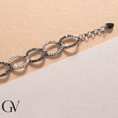 Pulsera en oro blanco 18K con diamantes negros y blancos