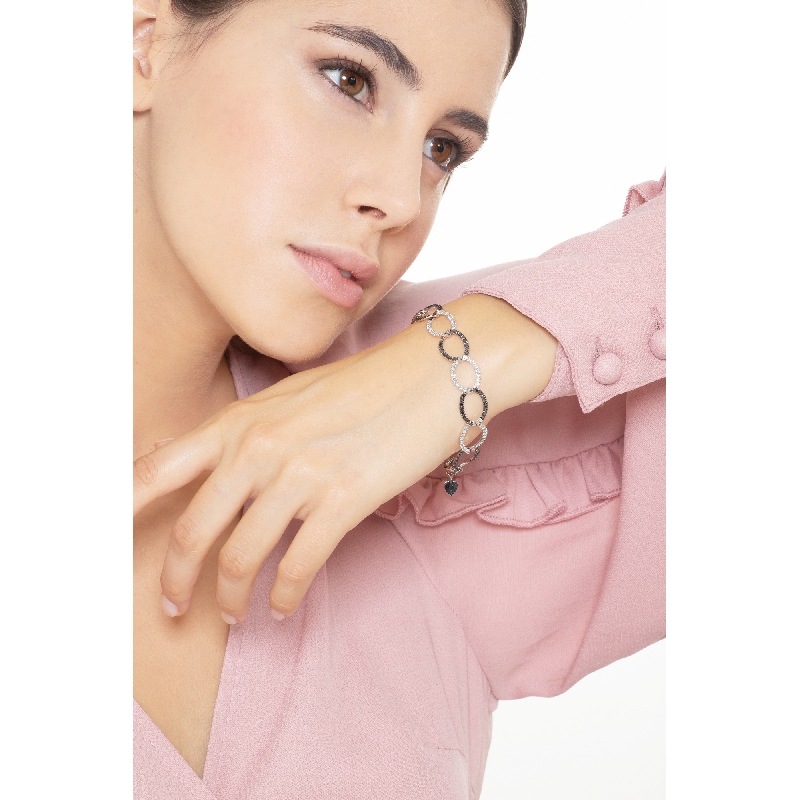 Pulsera en oro blanco 18K con diamantes negros y blancos Pulsera en oro blanco 18K con diamantes negros y blancos